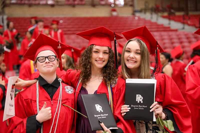 Student in graduation cap and gown.