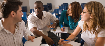 Classroom full of teachers talking with each other