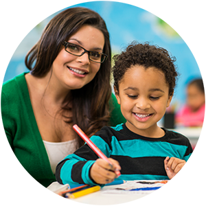 Smiling teacher with a young student